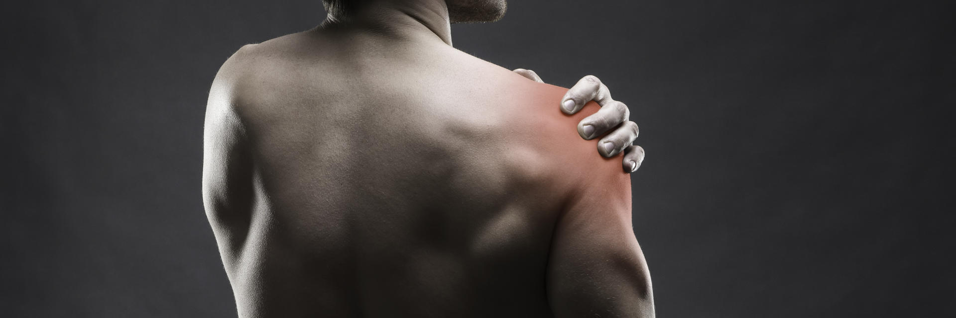 A man with suffering from shoulder tendonitis.