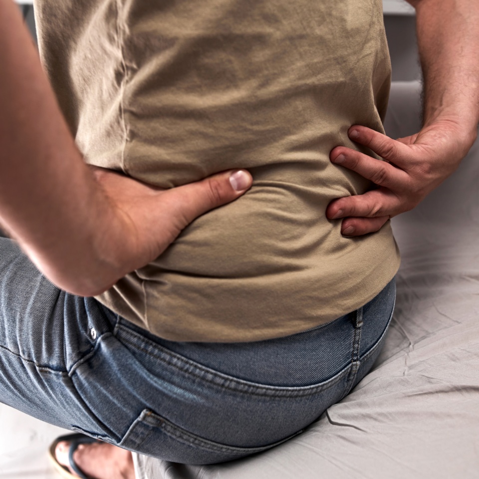 Adult caucasian man with hip pain.